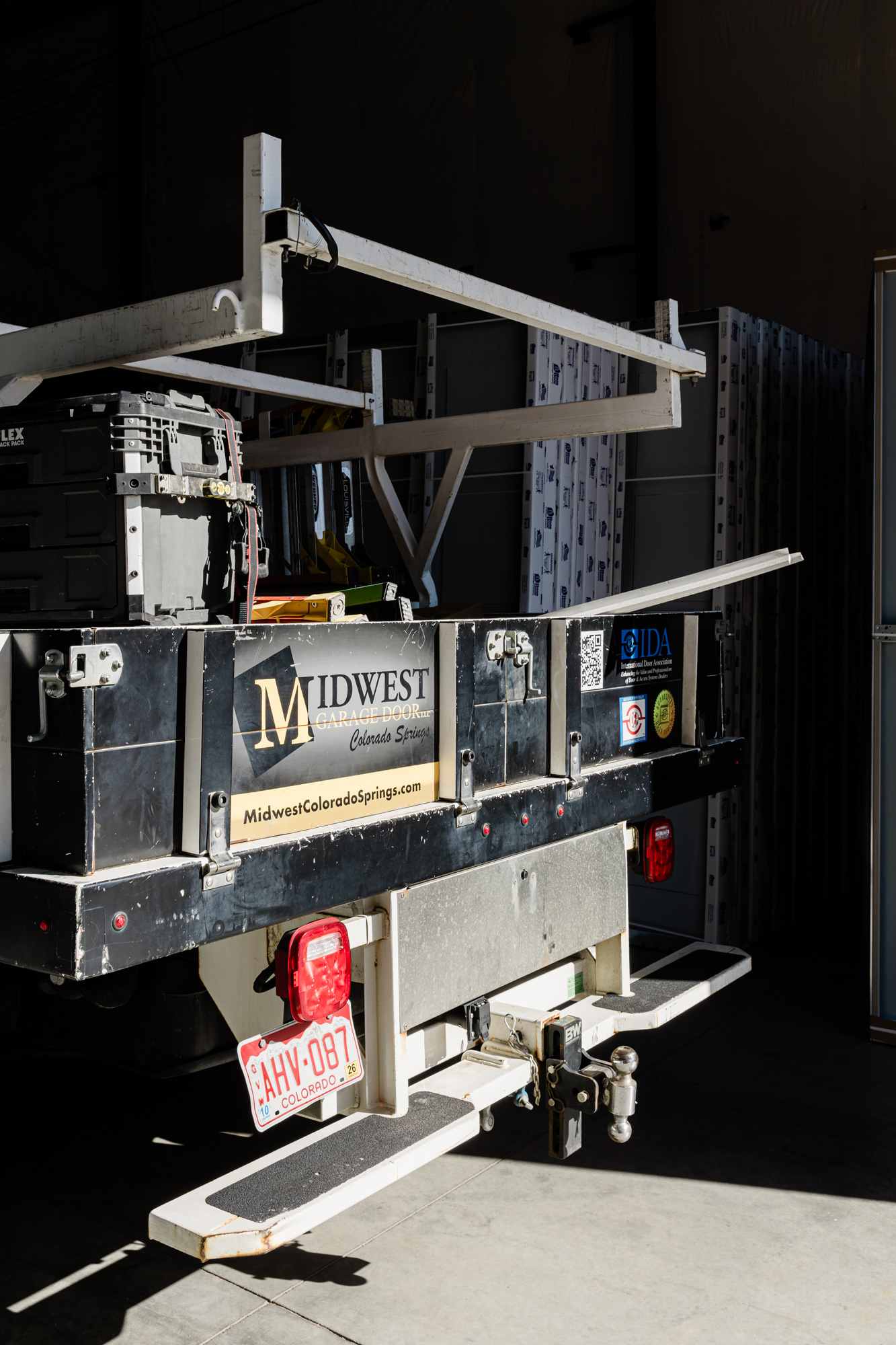 Close-up of garage door opener equipment and mechanical components.